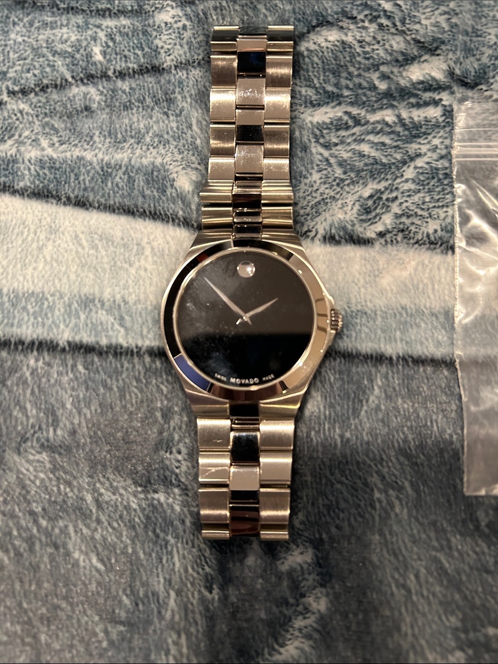 Movado Watch with box . Needs a new battery.